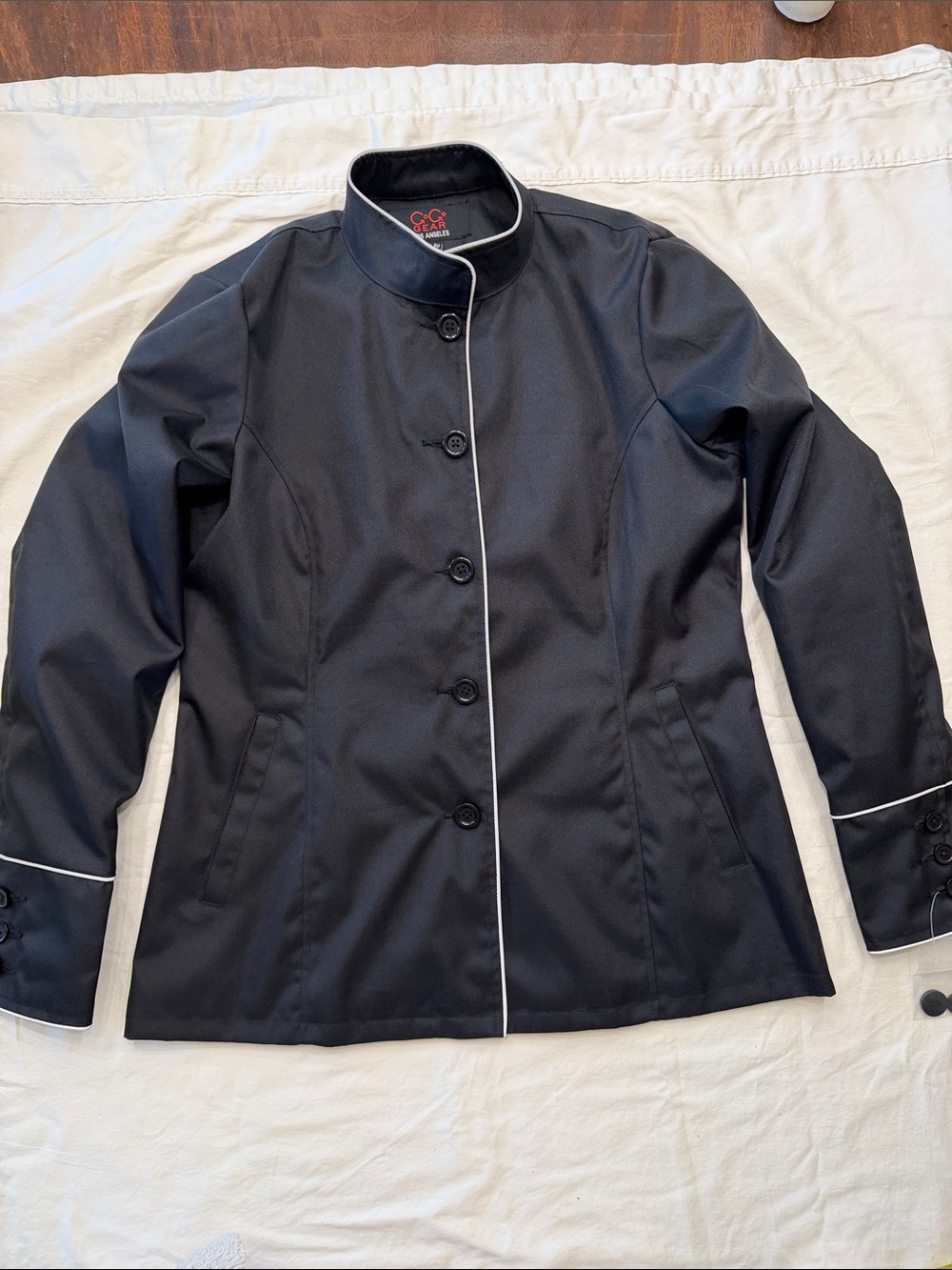 Black scooter or motorcycle jacket